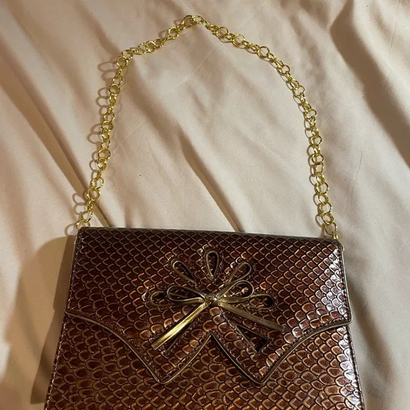 Bellini Gold Textured Clutch with Gold Chain and Bow Detail, OS - Picture 3 of 15